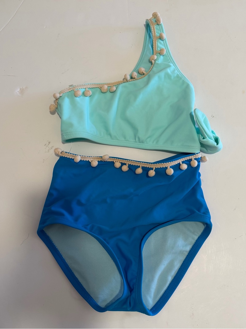 One-Shoulder Two Tone Blue Girls One-Piece Swimsuit with Pom Trim